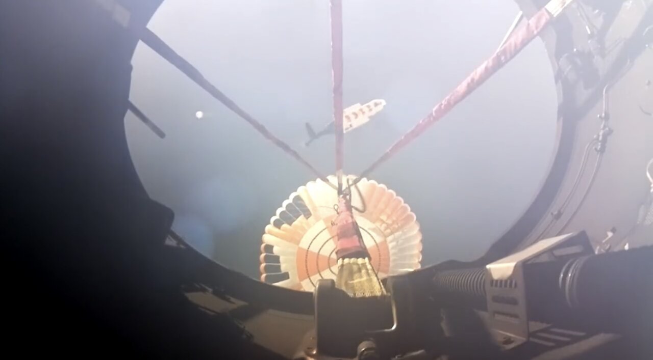 Rocket Lab’s Helicopter Catching First Stage Seen From Inside Booster Cam