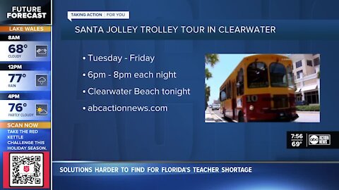 Santa cruises through Clearwater on fire engine