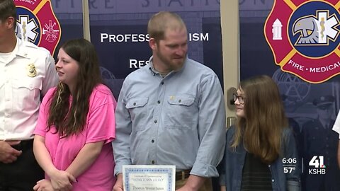 Boy, his dad recognized after saving toddler from drowning