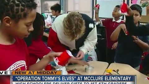 High School students deliver gifts to kids for Operation Tommy's Elves