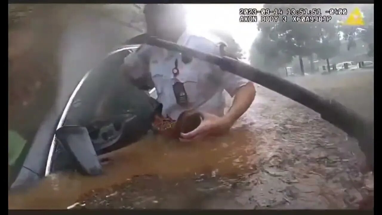 Officers rescue man trapped in car during a flash flood