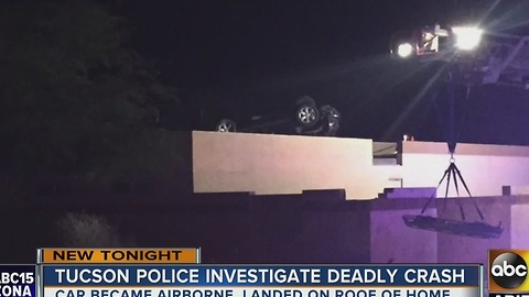 Tucson PD: 1 killed after car lands on top of home