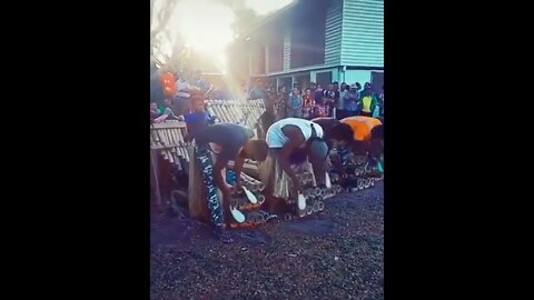 Group playing the drum