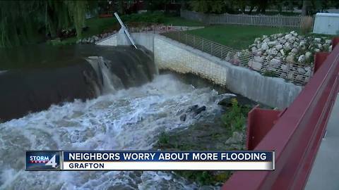 Rising Milwaukee River floods Grafton