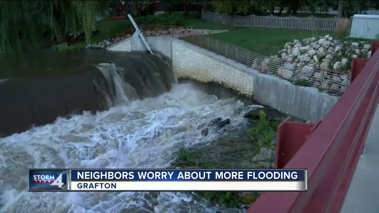 Rising Milwaukee River floods Grafton