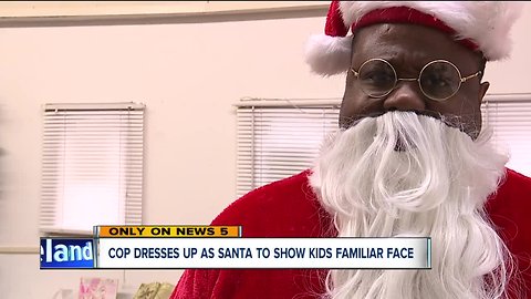 Local officer helps children see a Santa that looks more like them