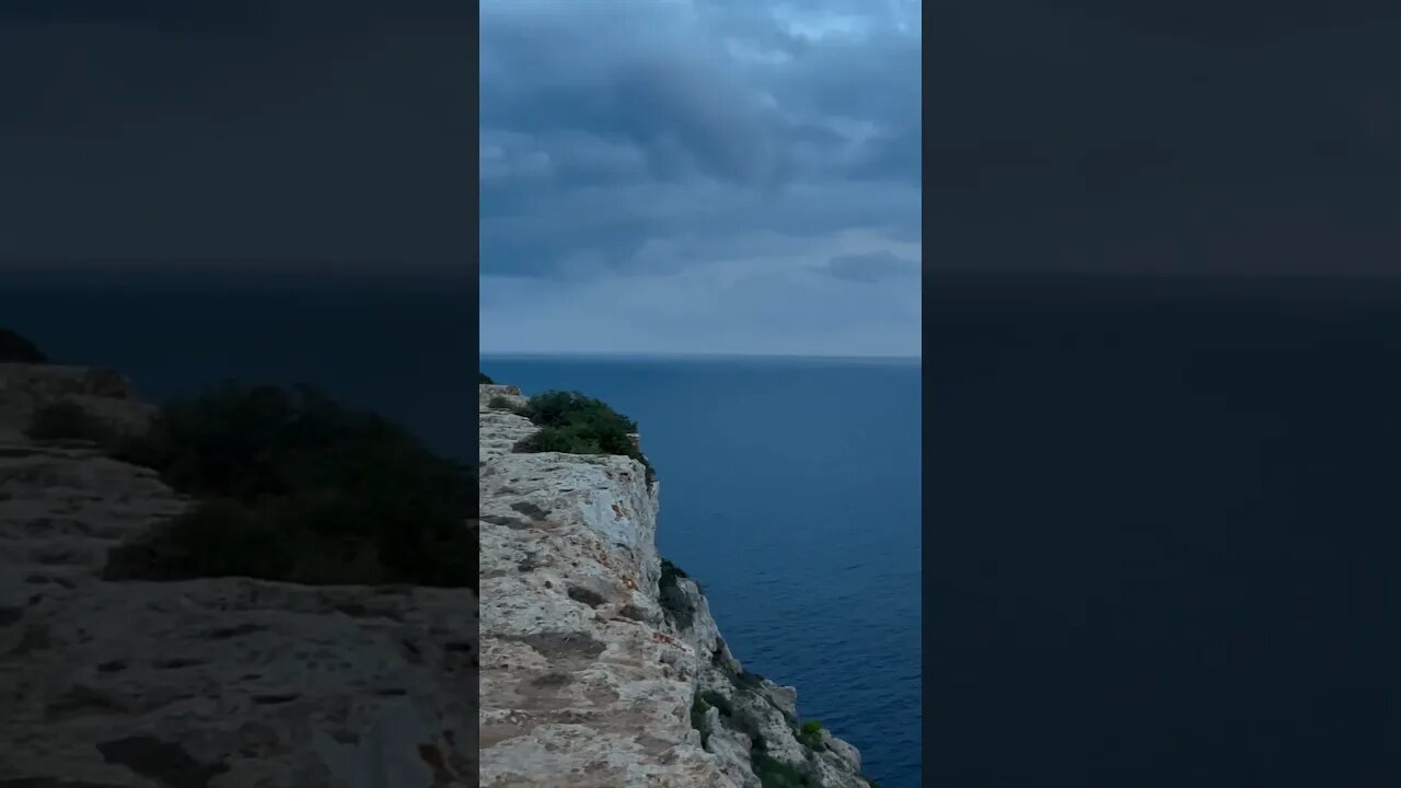 Light house over cliff side