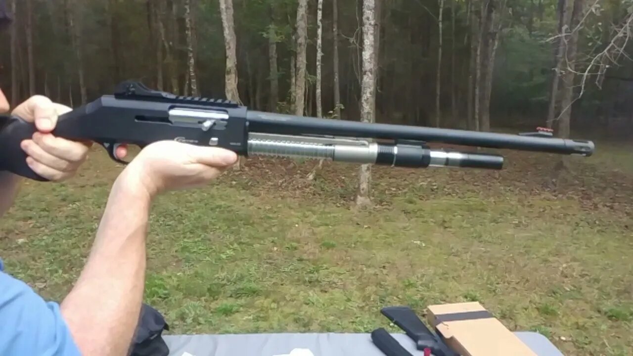 Gas system operation Slow Motion firing \\ 12GA \\ Tactical semi-auto shotgun VSAST parts exposed.