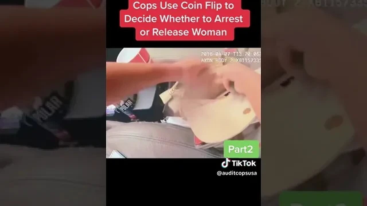 COP BODYCAM OFFICER COIN FLIPS TO DECIDE IF HE SHOULD ARREST A WOMAN