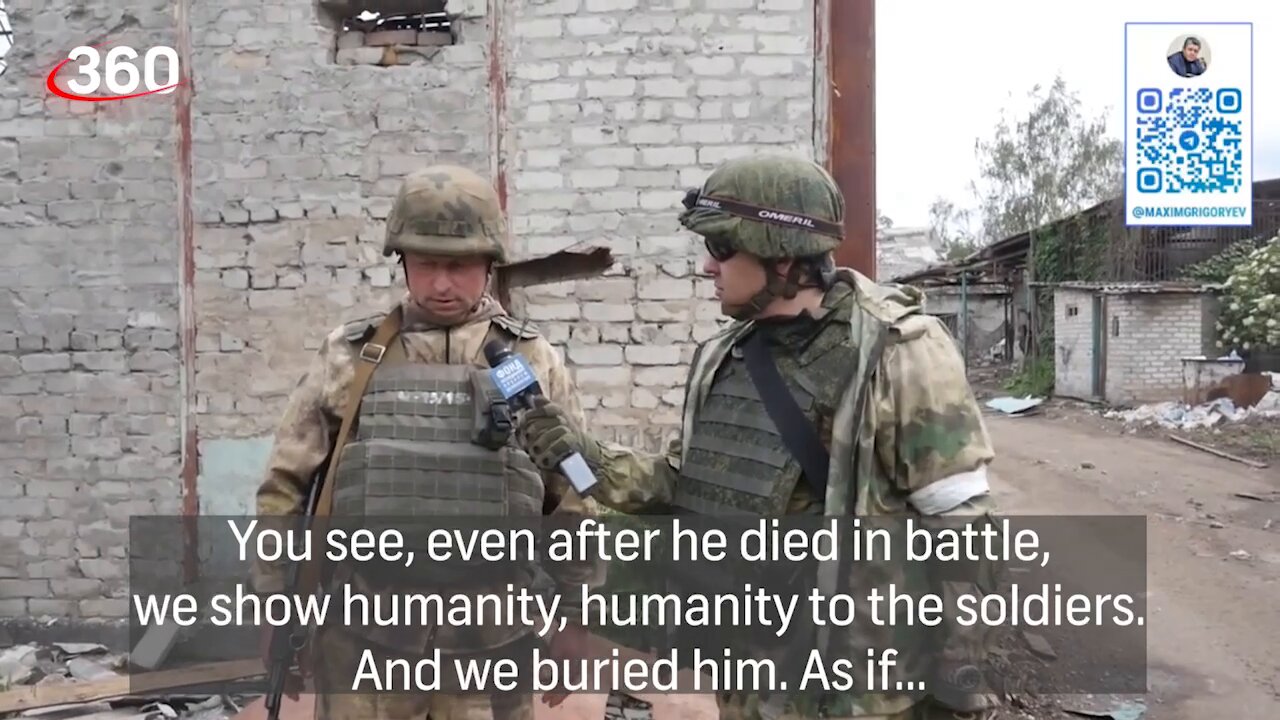 An unidentified Ukrainian soldier is buried with respect by Russian-allied forces