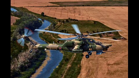 Mil Mi-28N, Mi-35M and Mi-26T helicopters flying over water