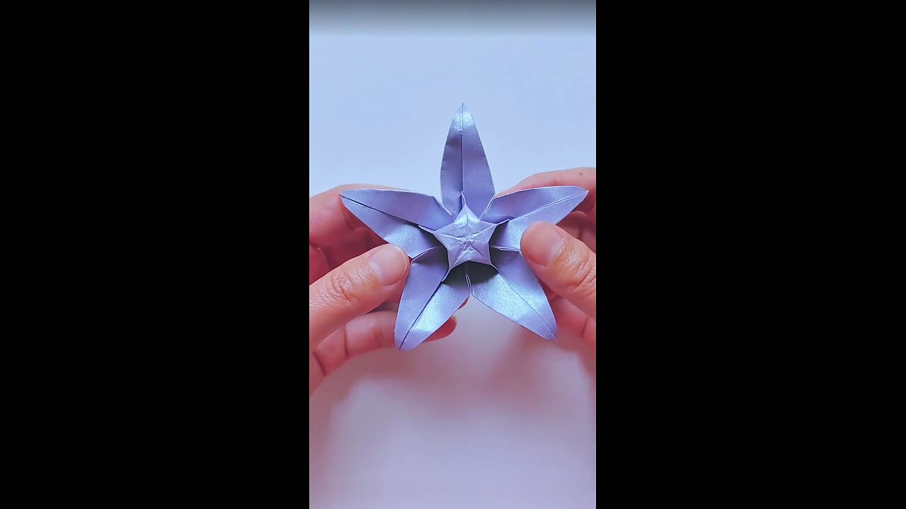 "Learn How to Make a Beautiful Origami Flower Step by Step"