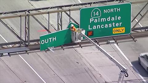 Freeway sign falls on Interstate 5