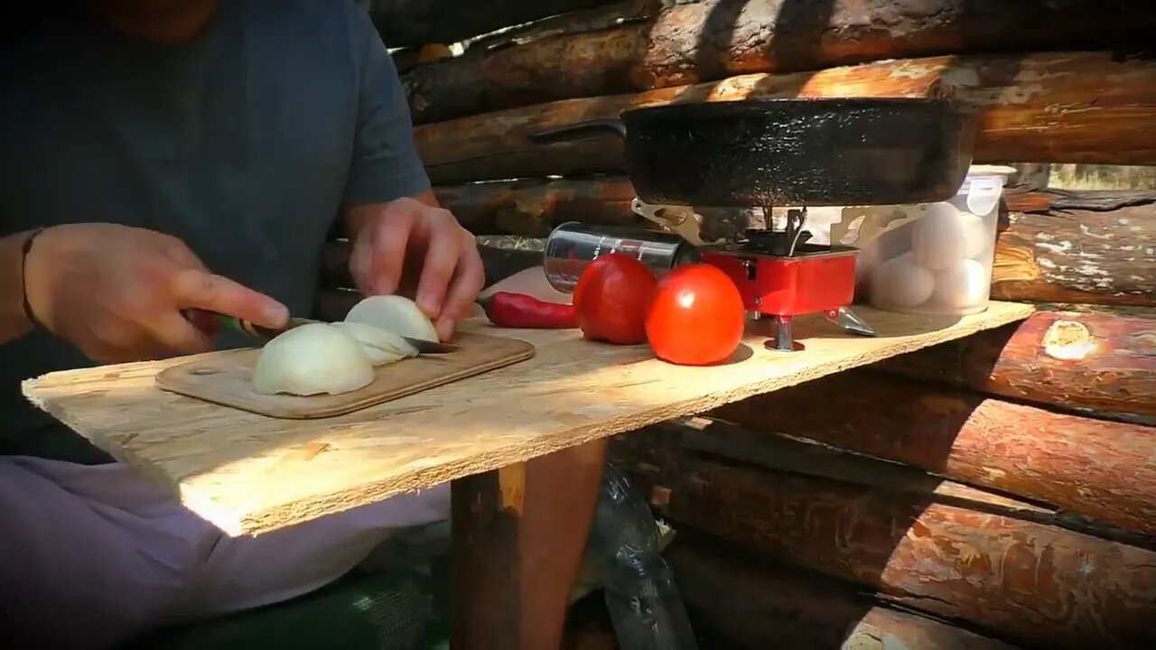 A jungle shelter in the jungle, fried eggs with sausage 1