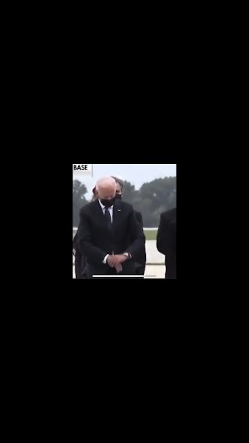 Biden checks his watch during Dignified transfer of 13 Fallen Soldier