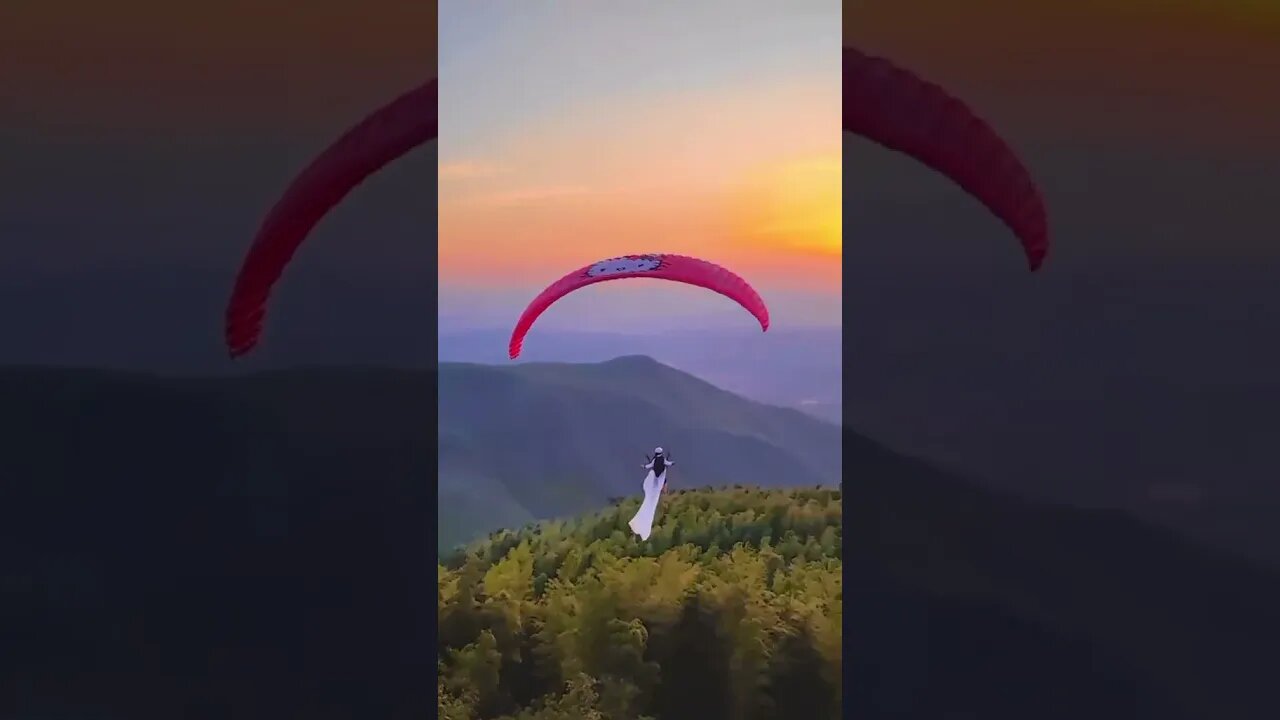 Paragliding of beautiful girl