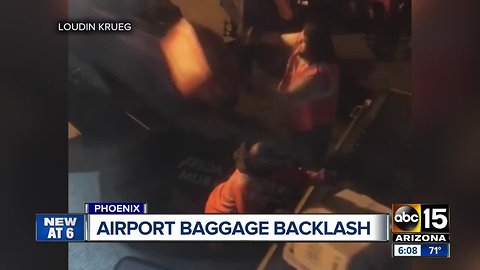 Video shows Southwest baggage handlers throwing customer's cargo