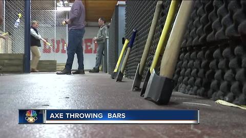 Axe throwing bars combine drinking and axe throwing