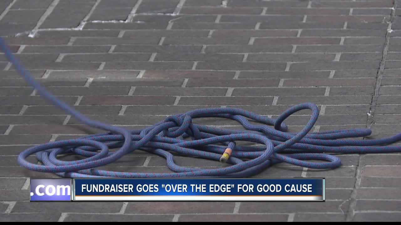 Participants rappel off U.S. Bank as "Over the Edge" fundraiser