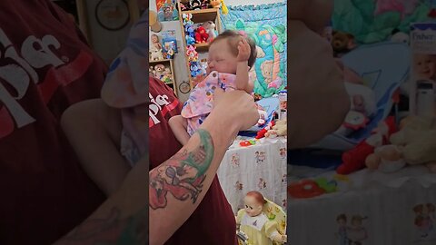 Holding FAKE Silicone Reborn Baby Doll