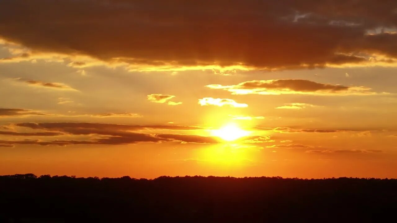 A Heavenly Sunset through the Clouds