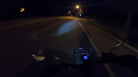 Bright Red Motorcycle With an LED Headlight = Totally Invisible