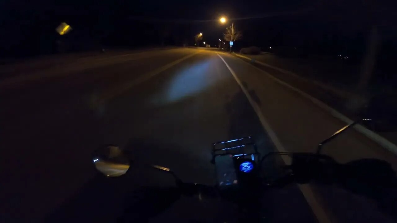 Bright Red Motorcycle With an LED Headlight = Totally Invisible