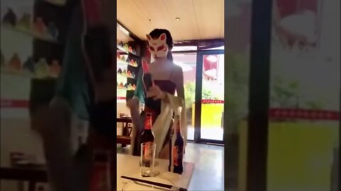 Masked Chinese Girl Opens Any Beer Bottle In A Flash