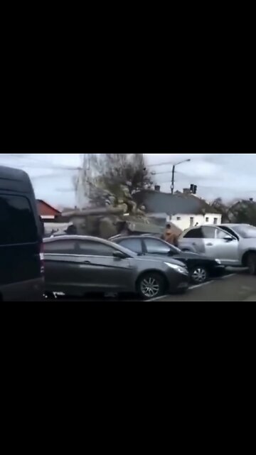 Tanks rolling through the streets of Ukraine today, crushing cars in the way
