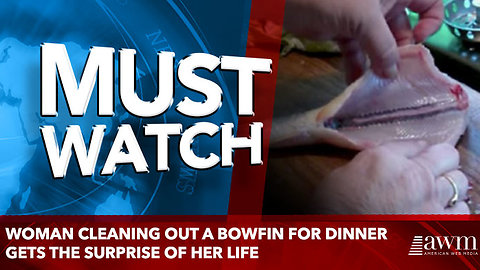 Woman Cleaning Out A Bowfin For Dinner Gets The Surprise Of Her Life