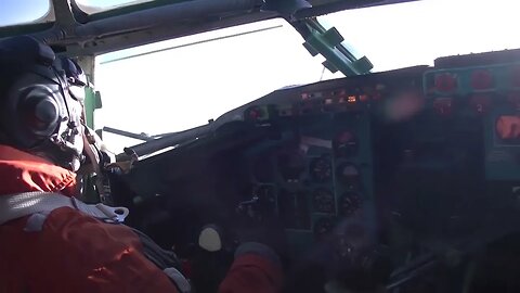 Two Russian Tu-95ms long-range strategic bombers above the neutral waters of the Sea of Japan.