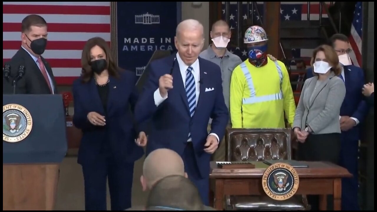 Maskless Biden Wanders Around The Stage Shaking Hands