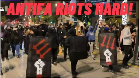 Antifa Rioters Jump On Moving Police Car, Fight Police In Los Angeles Riot!