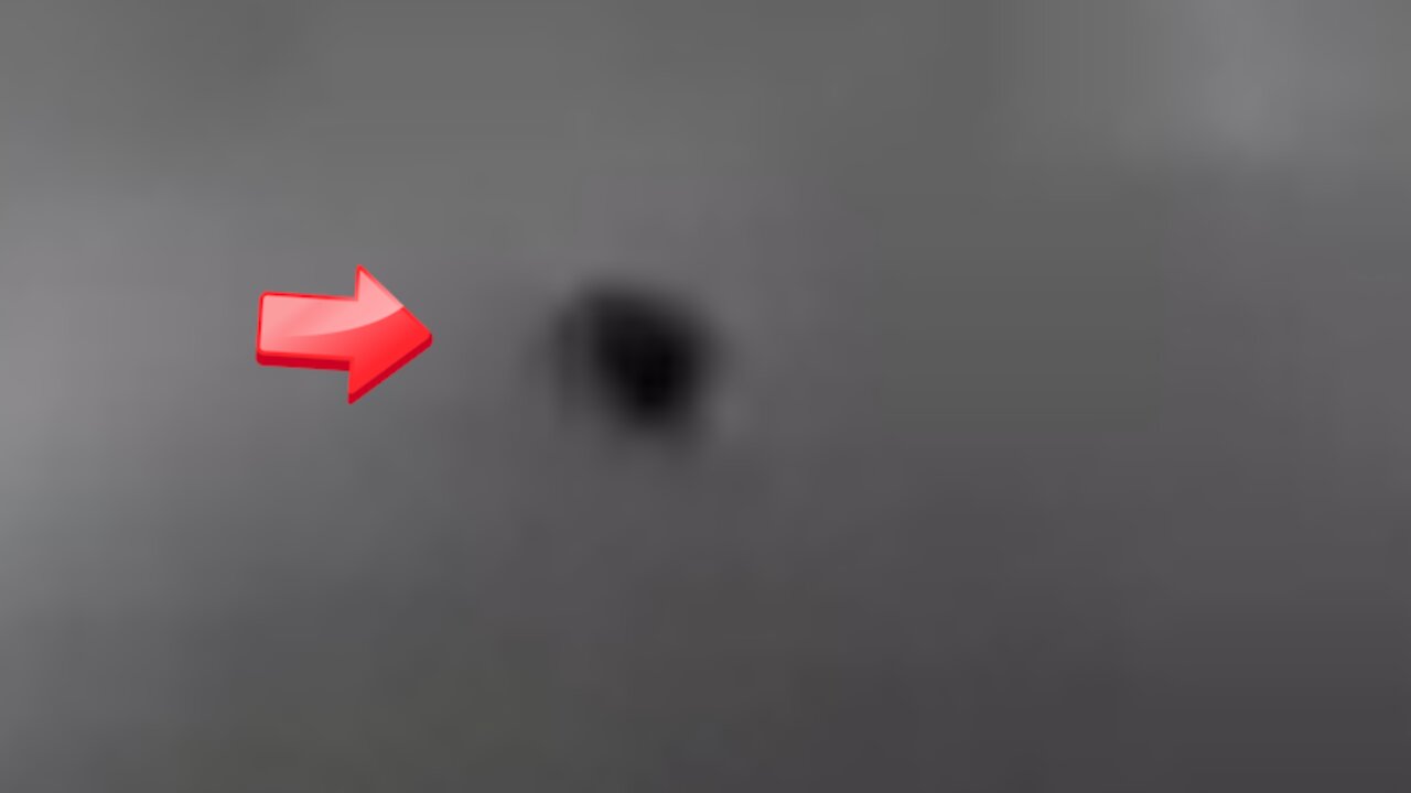 The photographer is trying his best to take a picture of a UFO [Space]