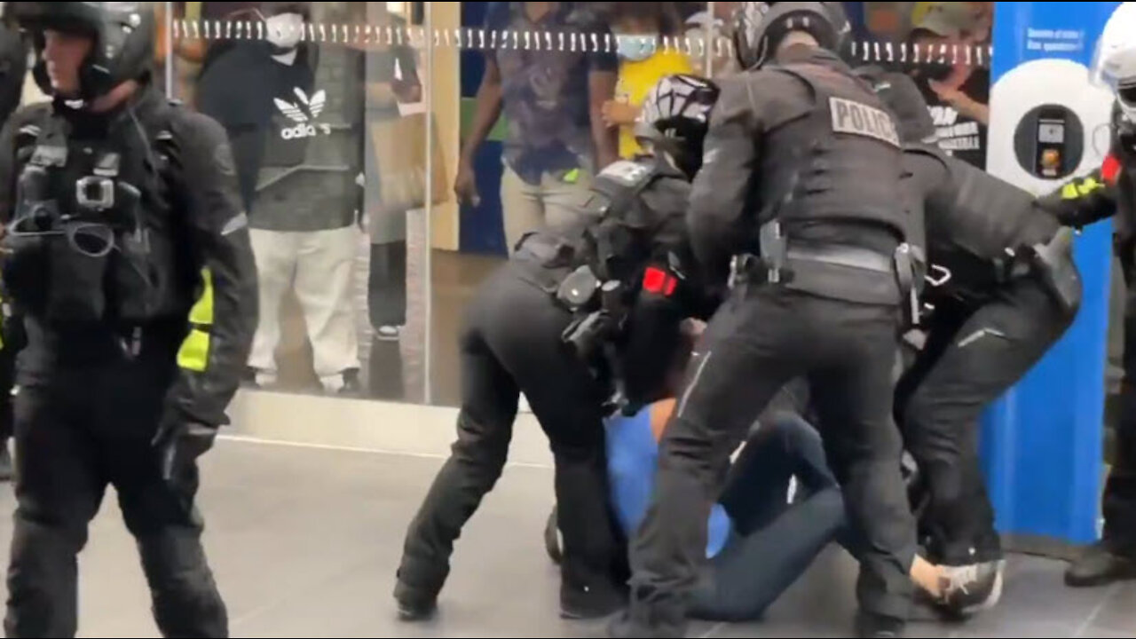 Paris police beat woman who tried to go shopping at the mall without a vaccine passport