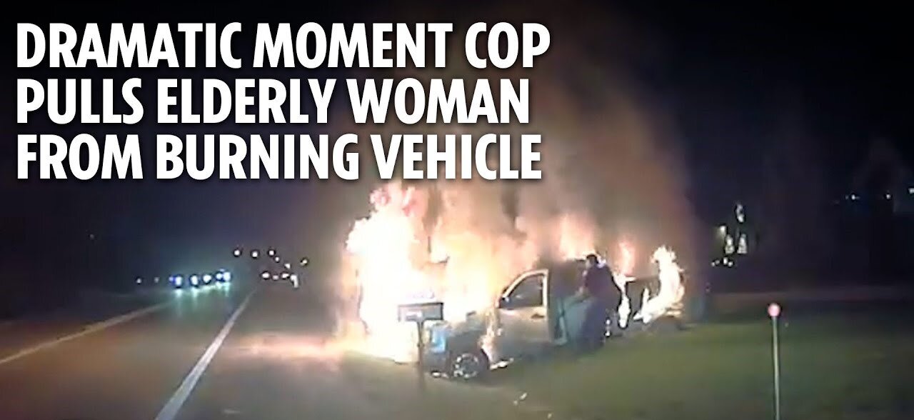 Dramatic moment cop pulls elderly woman from burning vehicle