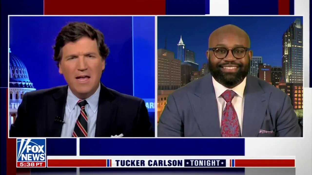 Pastor John Amanchukwu speaking with Tucker Carlson