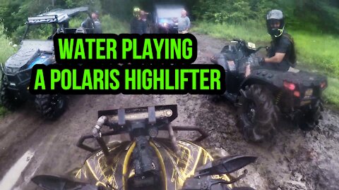 Water playing with a Polaris highlifter