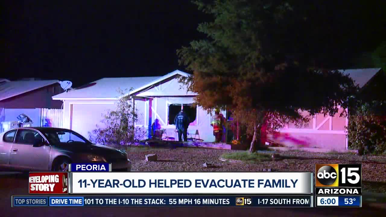 Children escape house fire after Christmas tree sparks flames