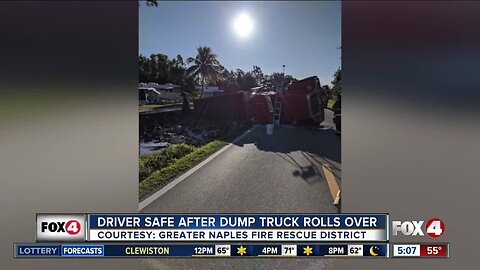 Driver safe after dump truck rolls over in Naples