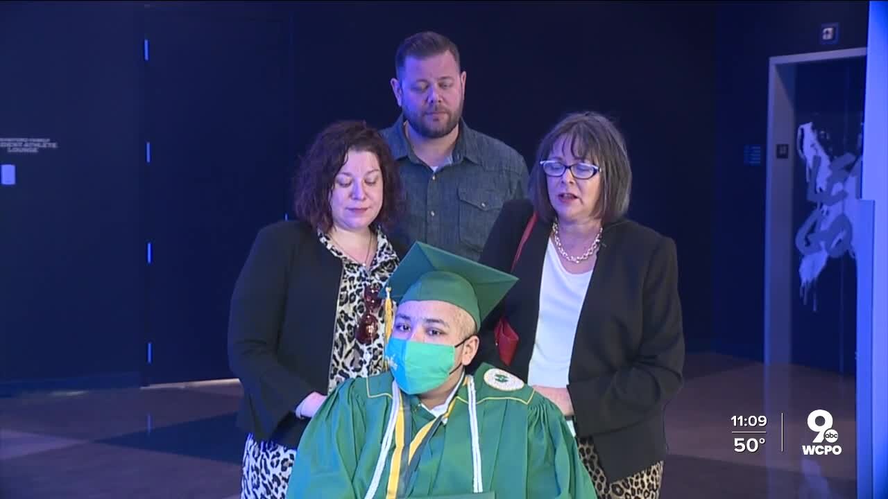 Sycamore senior diagnosed with brain tumor walks across graduation stage