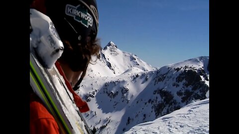 Skier Descends from a Huge Mountain / Crazy