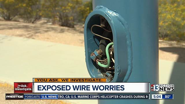 Missing light pole panels expose wires at Las Vegas park