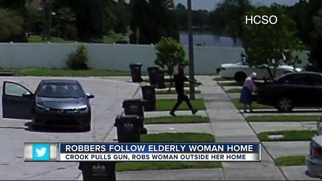 Suspects follow 86-year-old woman home, rob her