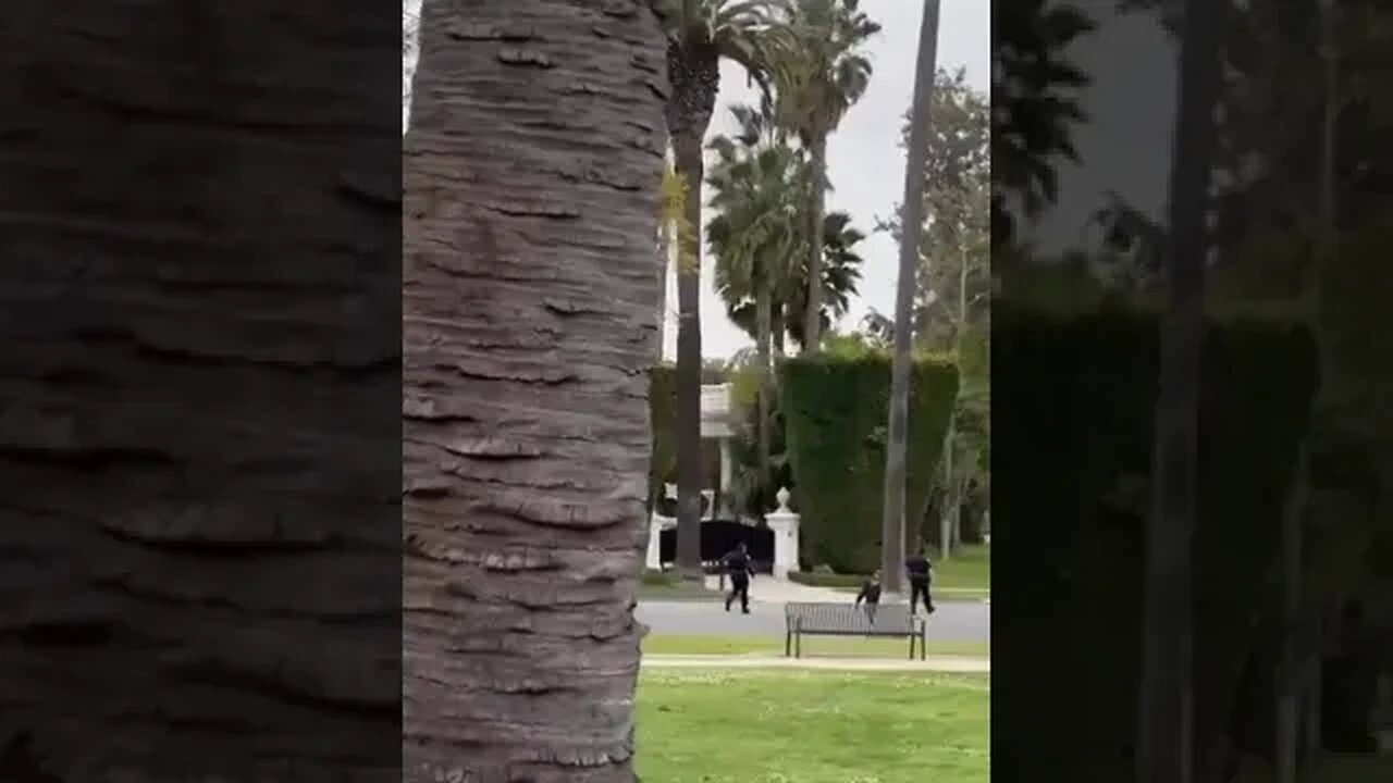 Sunset/Beverly Drive - Transient running around w knife threatening / attacking park visitors.