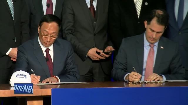 Walker, Foxconn leader sign plant contract