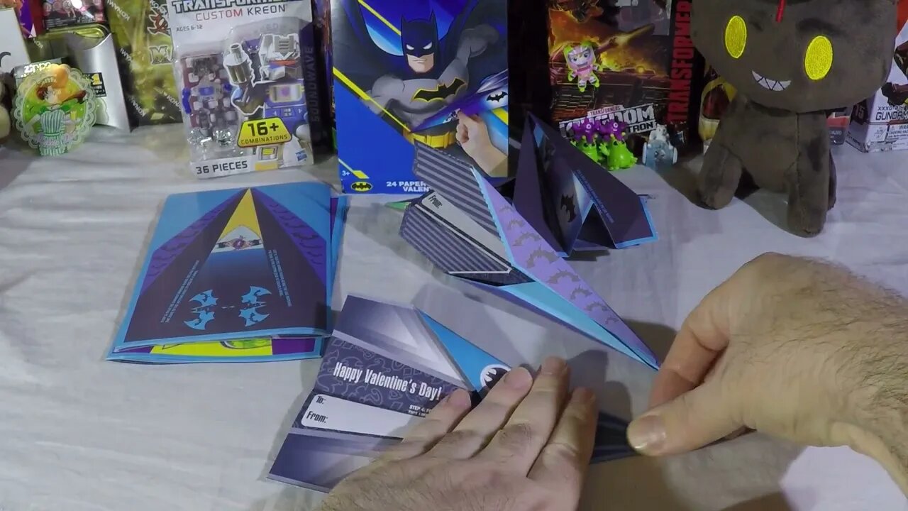 Folding Batman paper air plane in real time