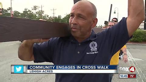 Community engages in Good Friday cross-walk