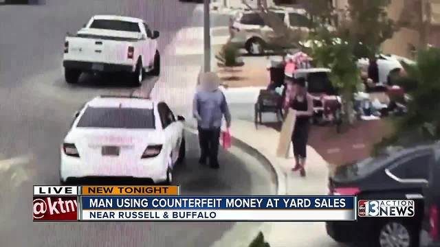 Man using fake money at yard sales