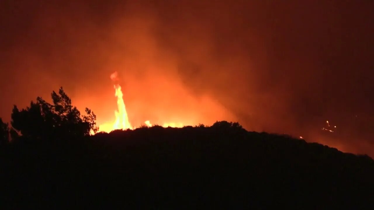 Wildfires continue to rage on Greek island of Rhodes after thousands flee